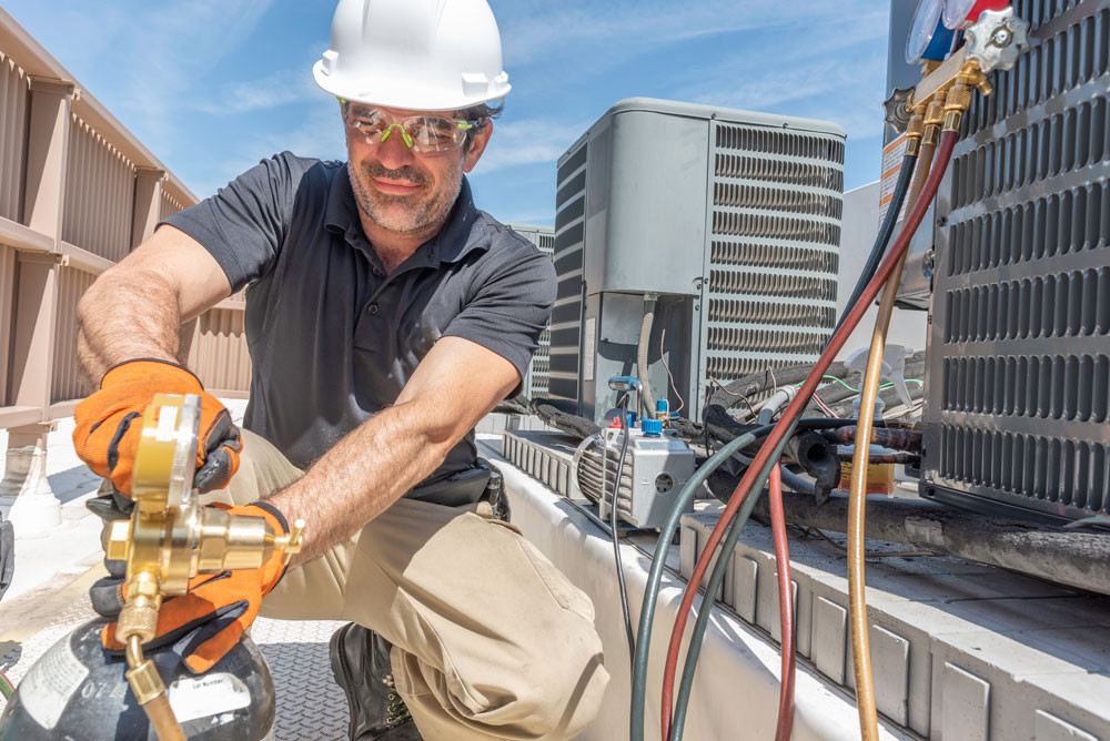 HVAC Technician Repairing AC