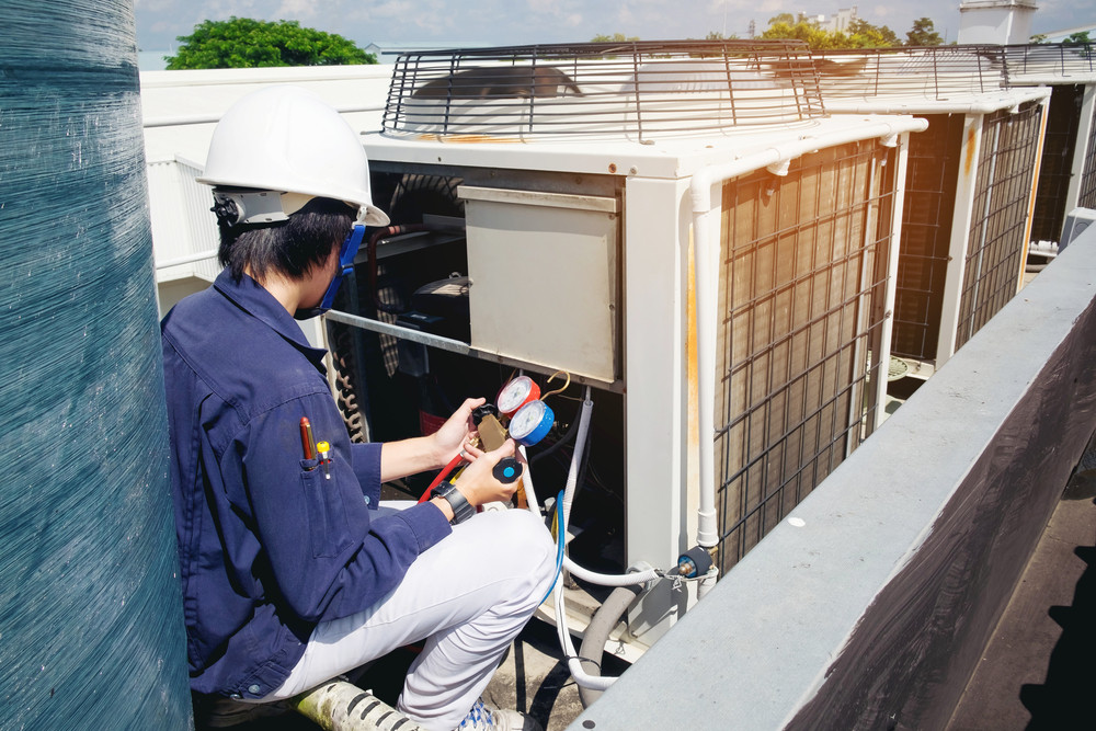 HVAC Technician Repairing AC